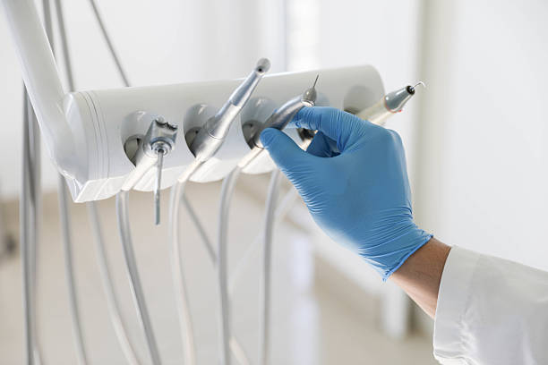 Professional Root Canal Treatment technician working in Elizabeth, NJ